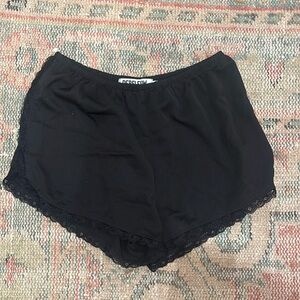 Rebelflow black shorts with lace trim
